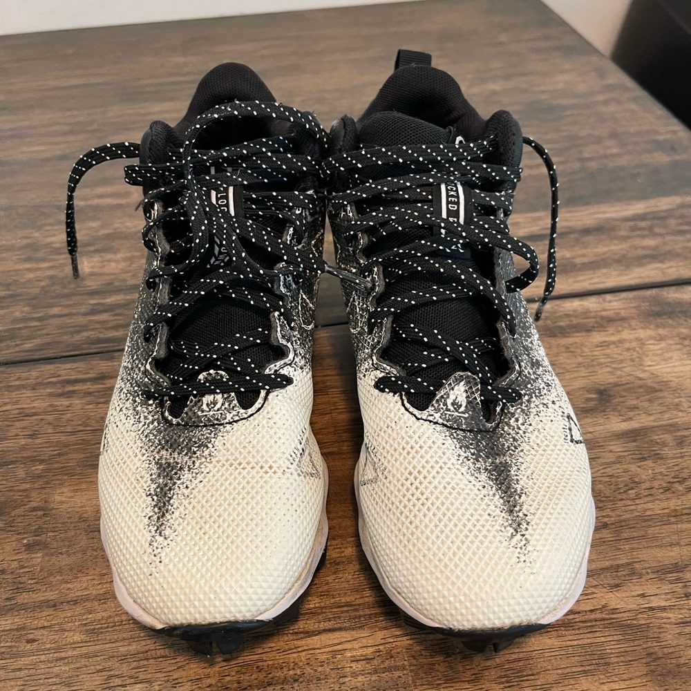 Youth Under Armour football cleats